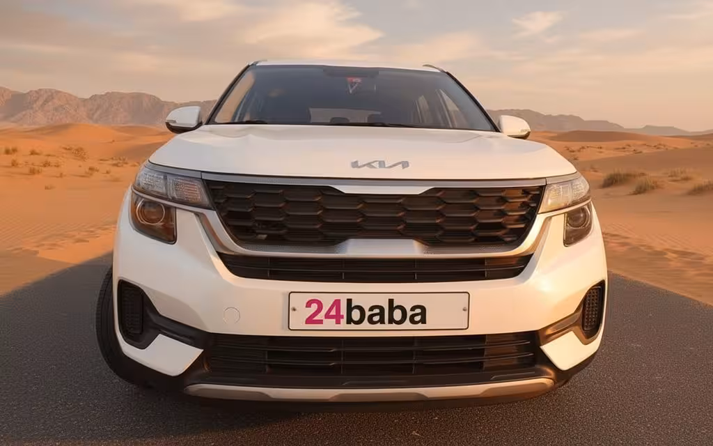Kia Seltos 2022 White front view with headlights – rental in Dubai