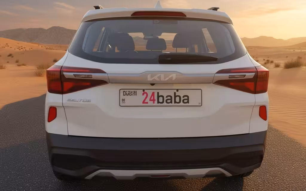 Kia Seltos 2022 White rear view showing taillights – rental in Dubai
