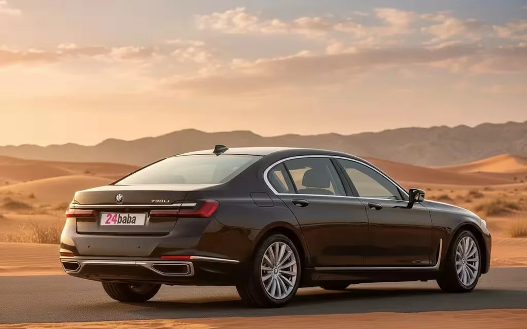 Bmw 730 2021 Black rear view showing taillights – rental in Dubai