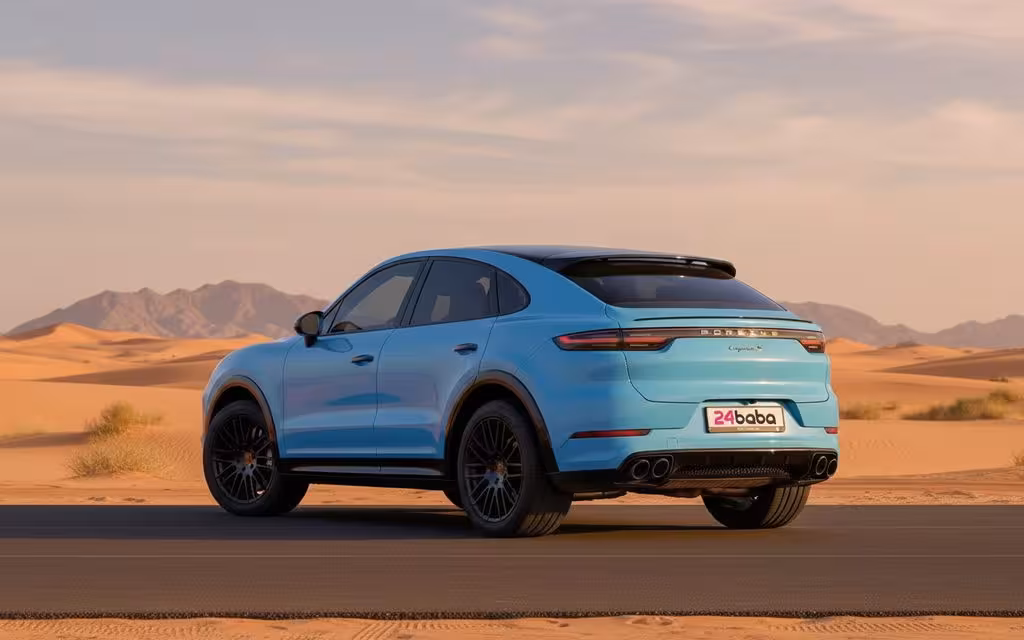 Porsche Cayenne 2023 Blue rear view showing taillights – rental in Dubai