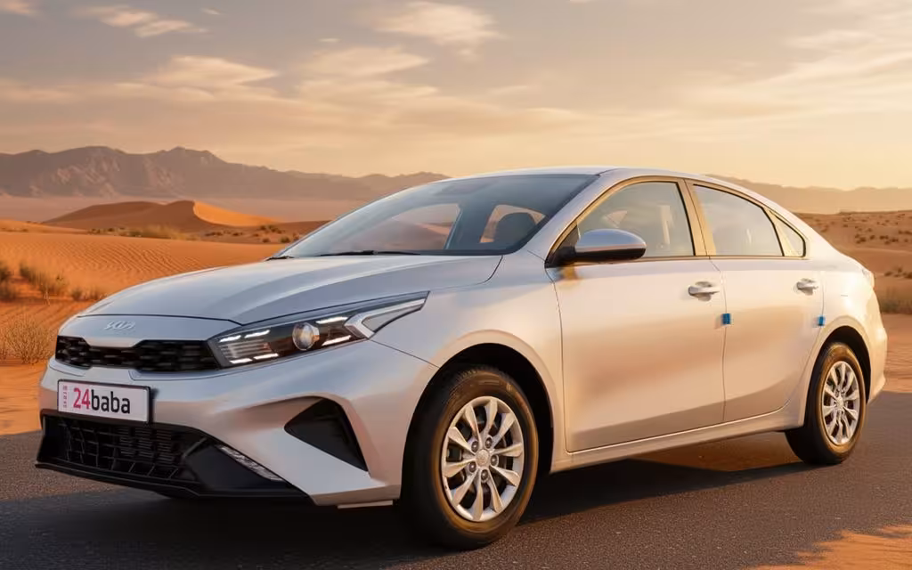 Kia Cerato 2024 White front view with headlights – rental in Dubai