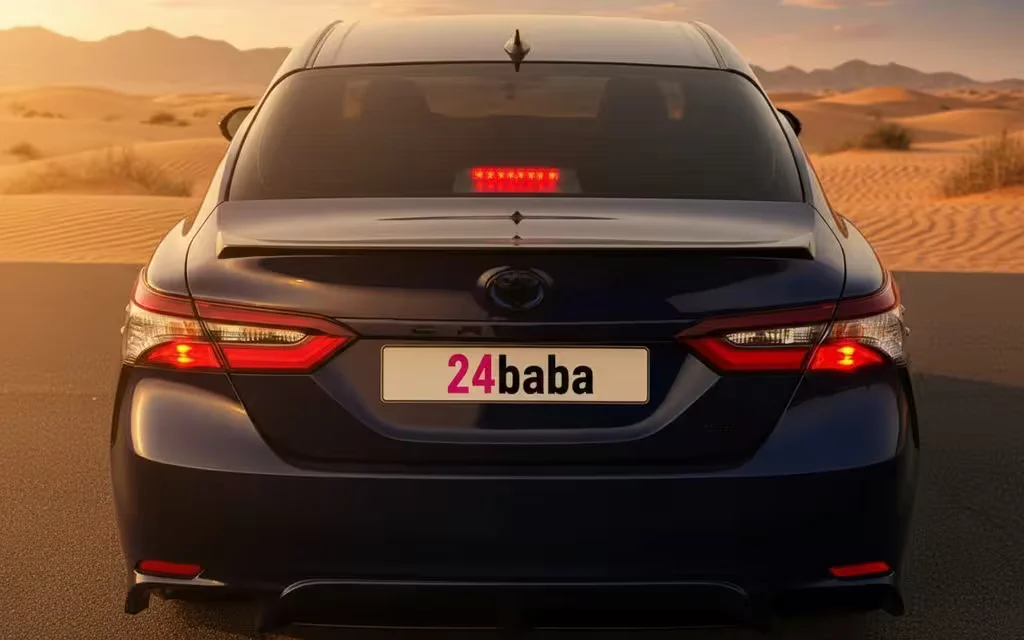 Toyota Camry 2023 Blue rear view showing taillights – rental in Dubai