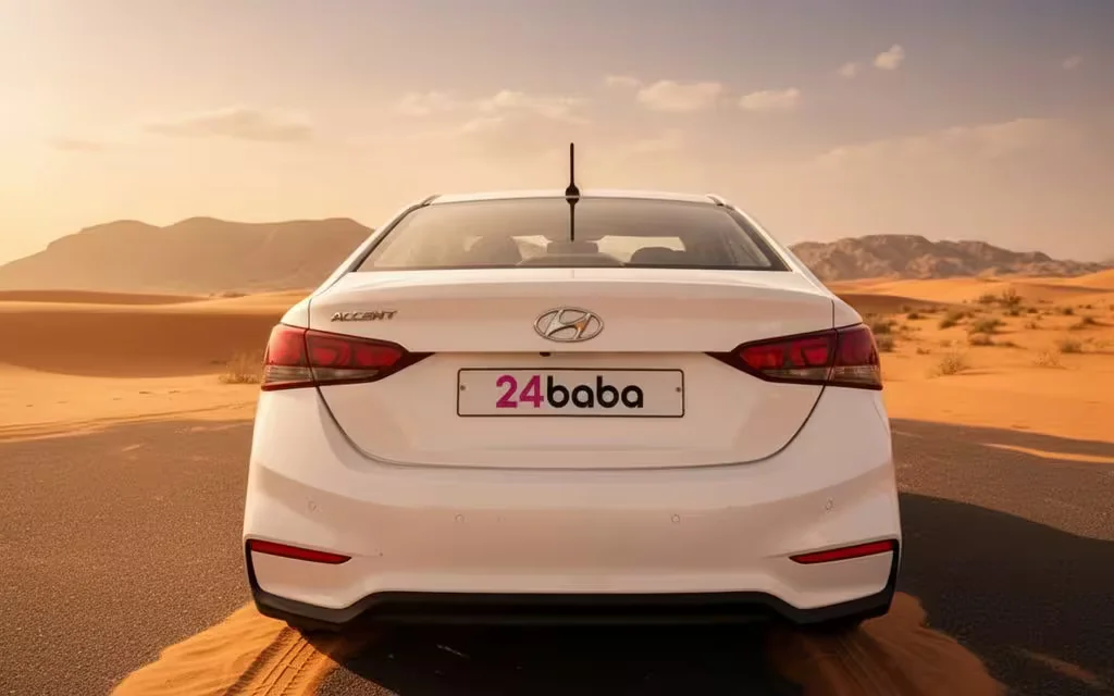 Hyundai Accent 2025 White rear view showing taillights – rental in Dubai