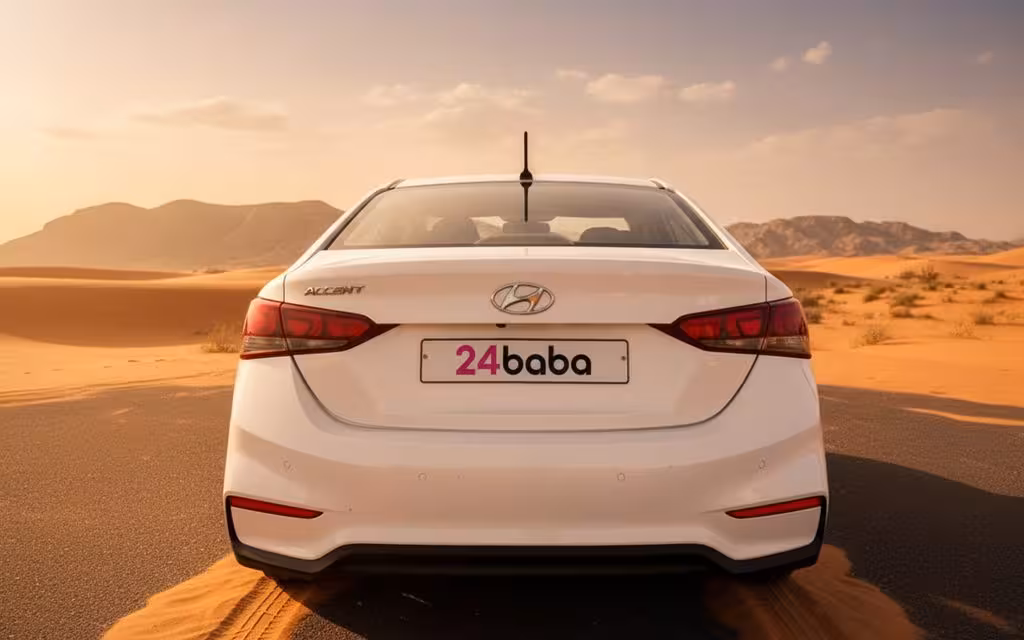 Hyundai Accent 2025 White rear view showing taillights – rental in Dubai