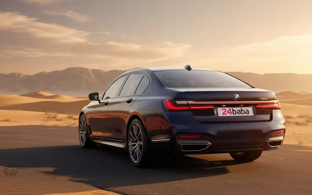 Bmw 730 2022 Blue rear view showing taillights – rental in Dubai