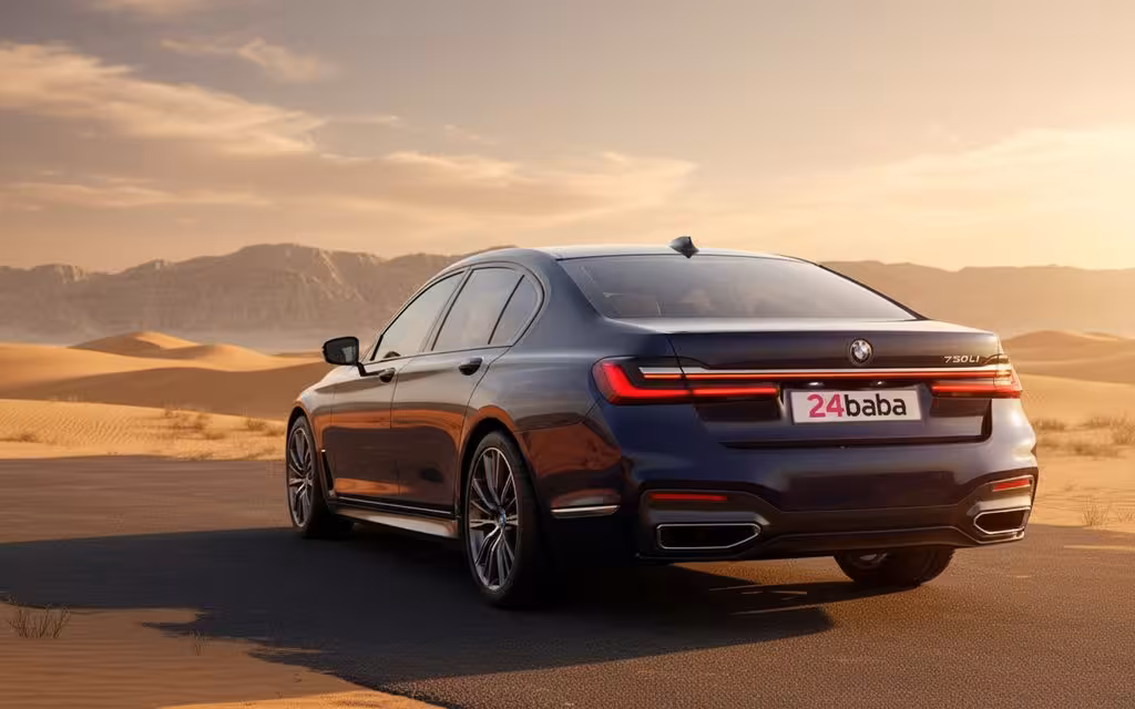 Bmw 730 2022 Blue rear view showing taillights – rental in Dubai