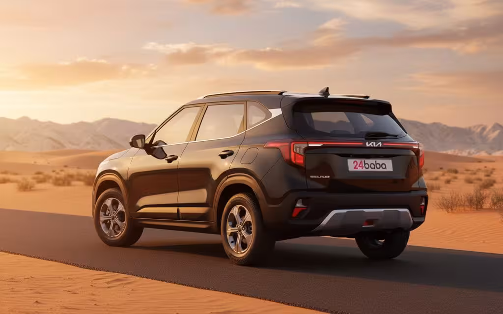 Kia Seltos 2024 Green rear view showing taillights – rental in Dubai