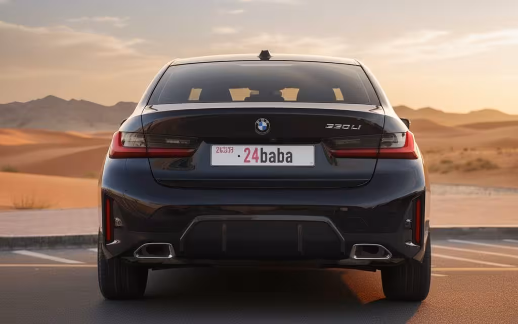 Bmw 330 2023 Black rear view showing taillights – rental in Dubai