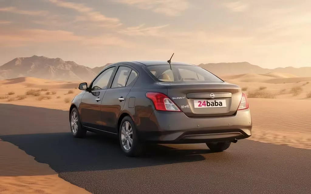 Nissan Sunny 2023 Grey rear view showing taillights – rental in Dubai