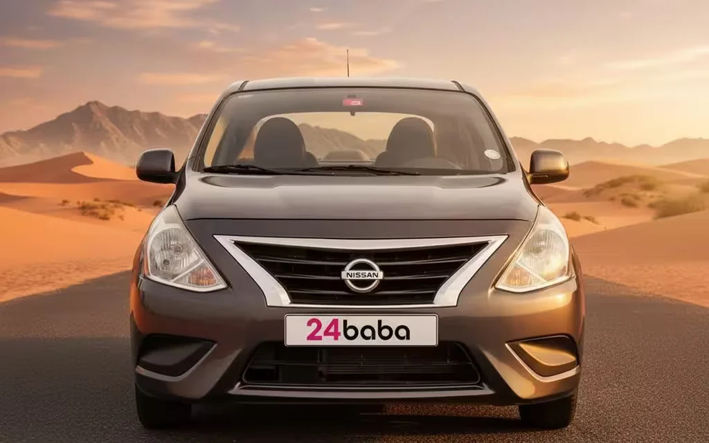 Nissan Sunny 2023 Grey front view with headlights – rental in Dubai