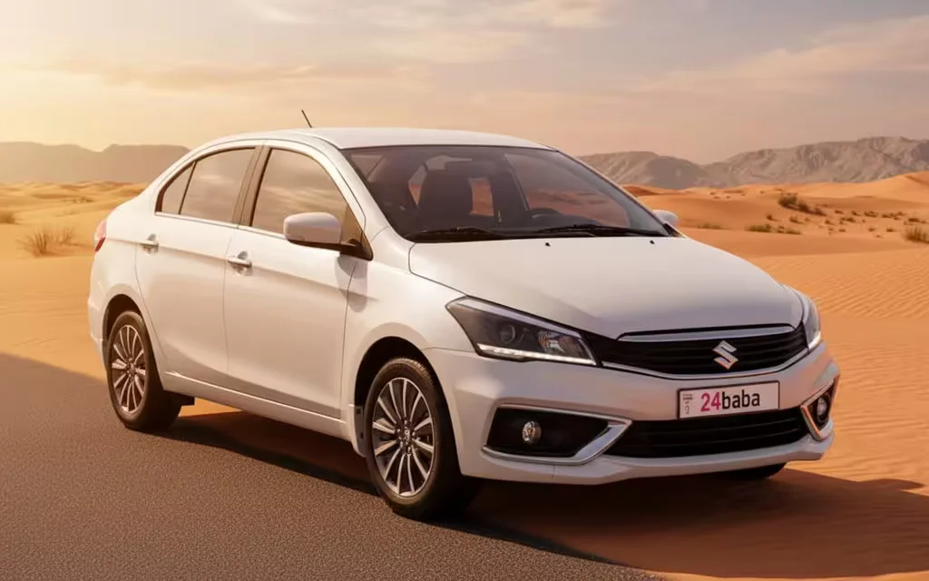 Suzuki Ciaz 2022 White front view with headlights – rental in Dubai