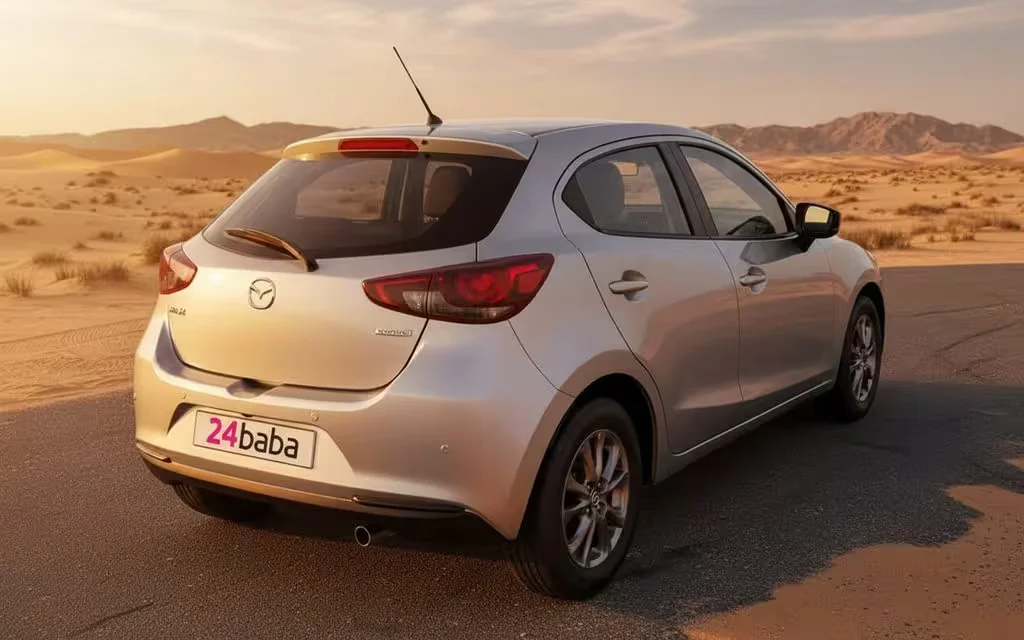 Mazda 2 2020 Silver rear view showing taillights – rental in Dubai