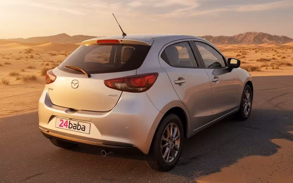 Mazda 2 2020 Silver rear view showing taillights – rental in Dubai