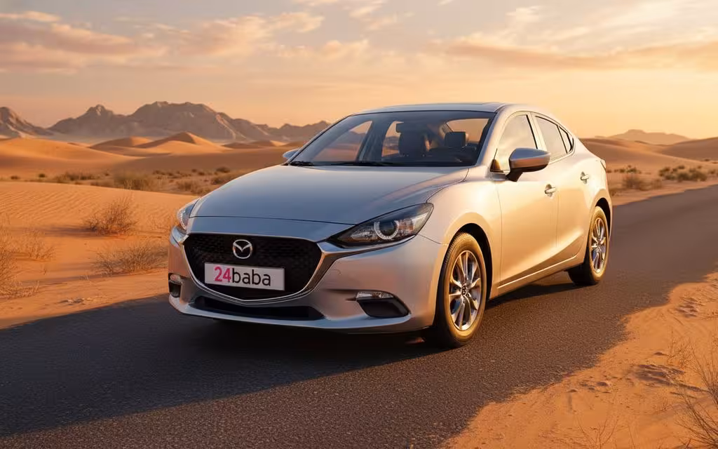 Mazda 2 2020 Silver front view with headlights – rental in Dubai