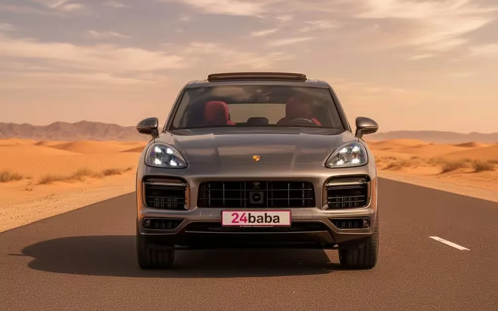 Porsche Cayenne 2023 Grey front view with headlights – rental in Dubai