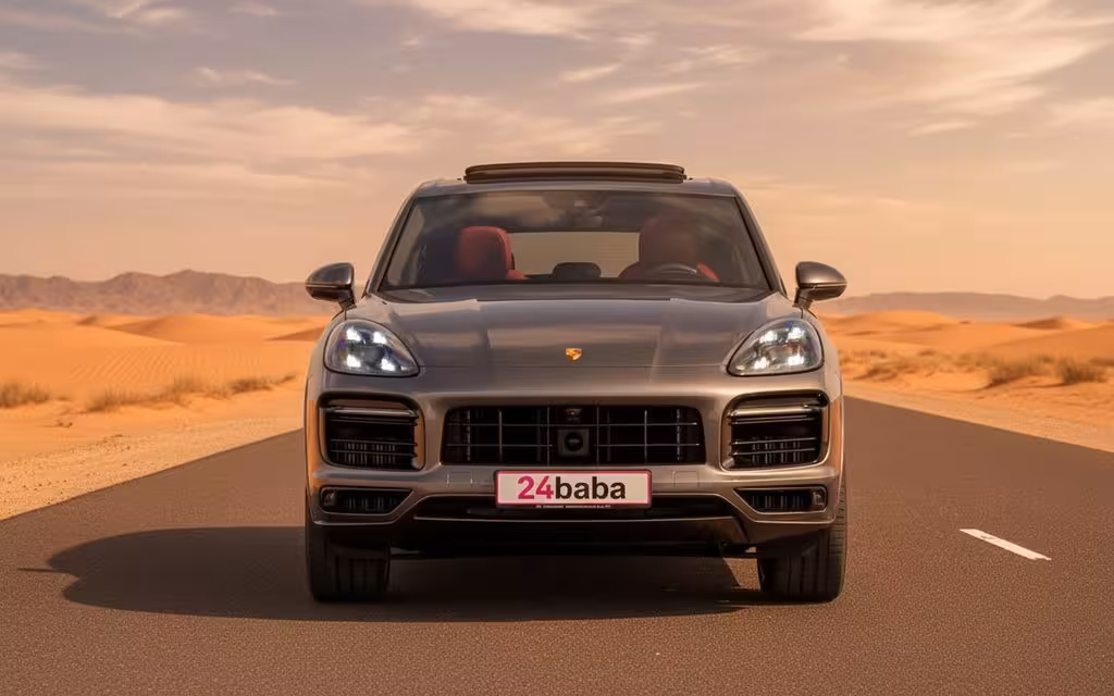 Porsche Cayenne 2023 Grey front view with headlights – rental in Dubai