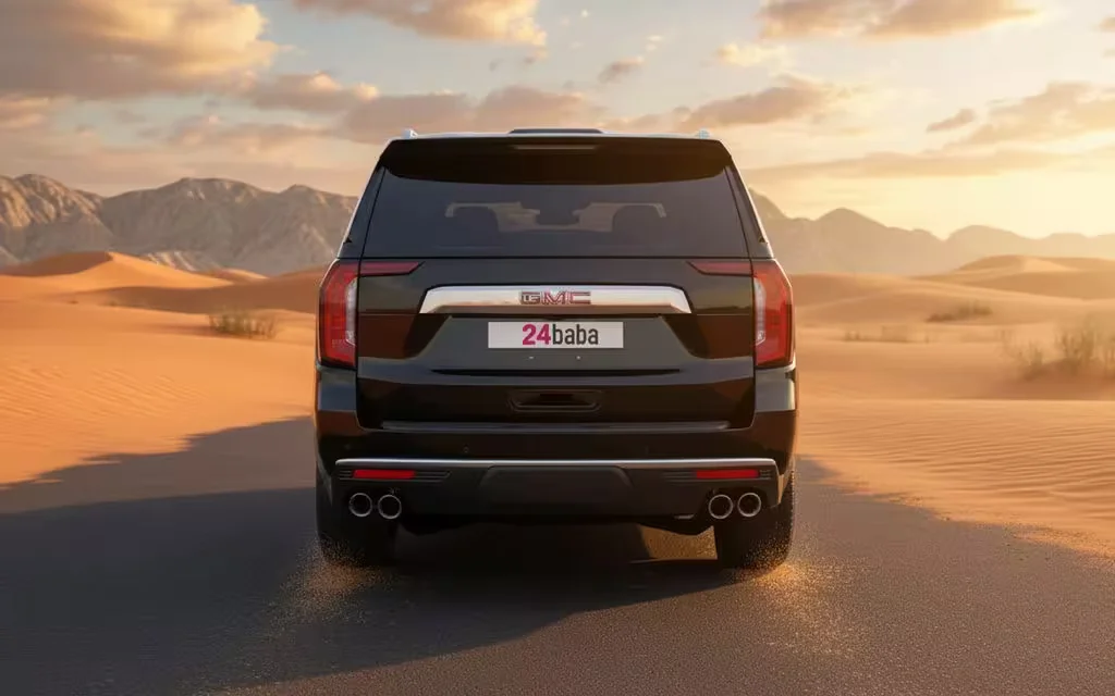Gmc Yukon 2023 Black rear view showing taillights – rental in Dubai