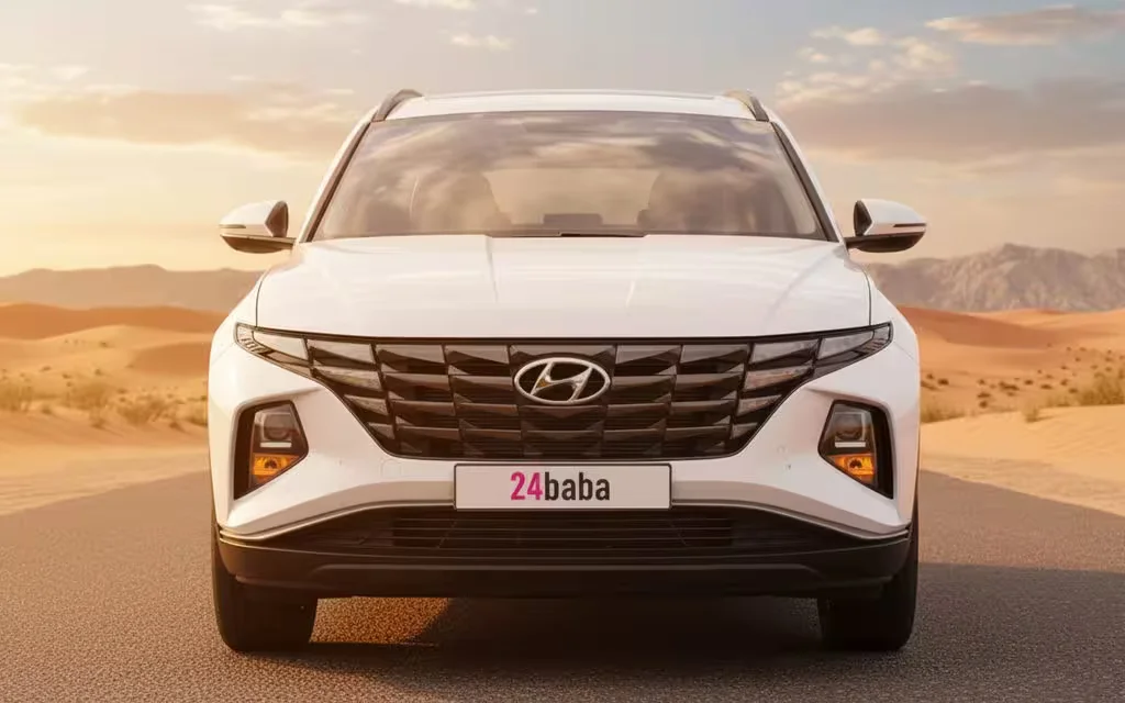 Hyundai Tucson 2023 White front view with headlights – rental in Dubai