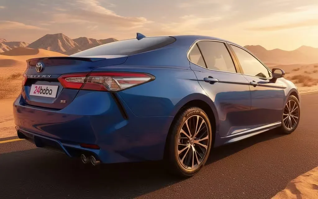 Toyota Camry 2025 Blue rear view showing taillights – rental in Dubai