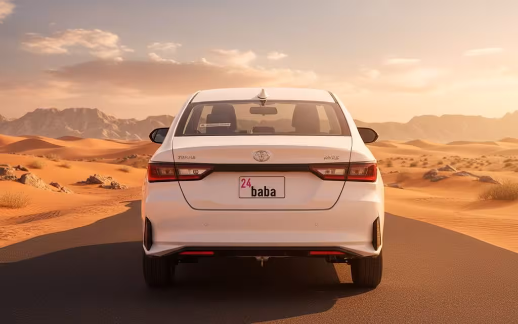 Toyota Yaris 2023 Silver rear view showing taillights – rental in Dubai