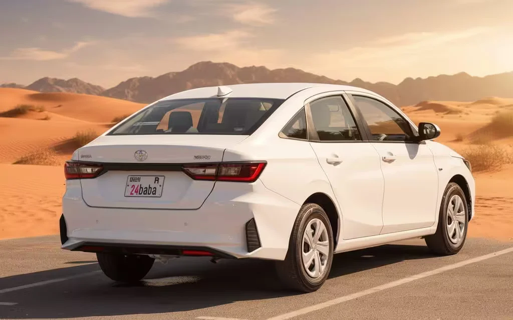 Toyota Yaris 2023 Silver rear view showing taillights – rental in Dubai