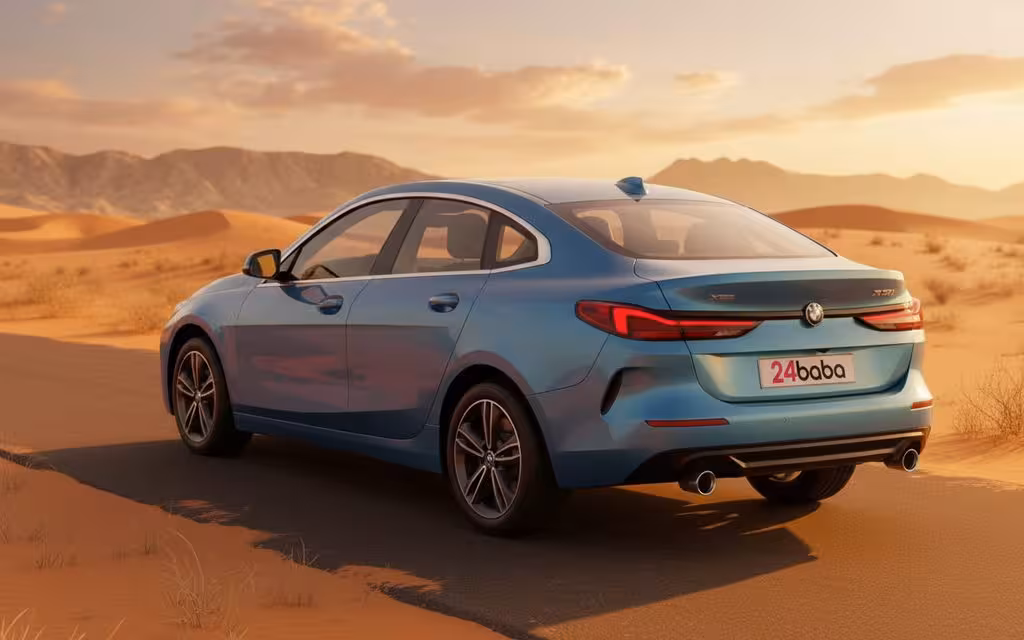 Bmw 228 2021 Blue rear view showing taillights – rental in Dubai