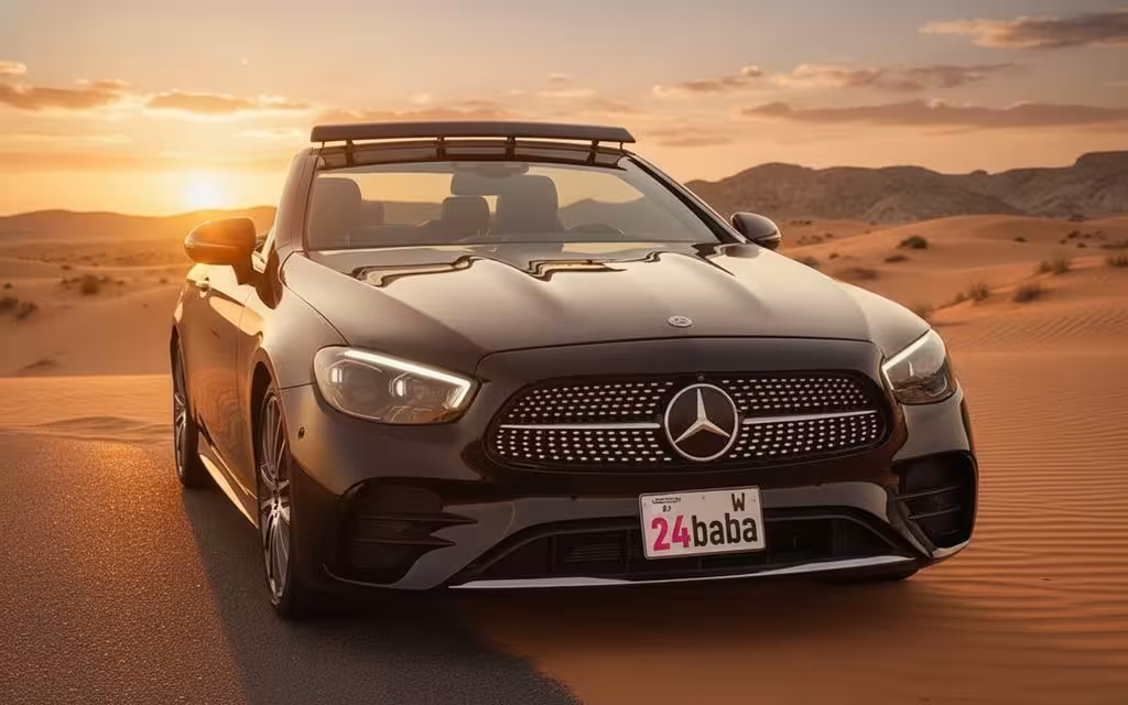 Mercedes E450 2022 Black front view with headlights – rental in Dubai