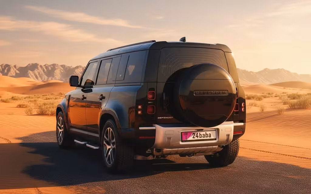 LandRover Defender 2024 Black rear view showing taillights – rental in Dubai