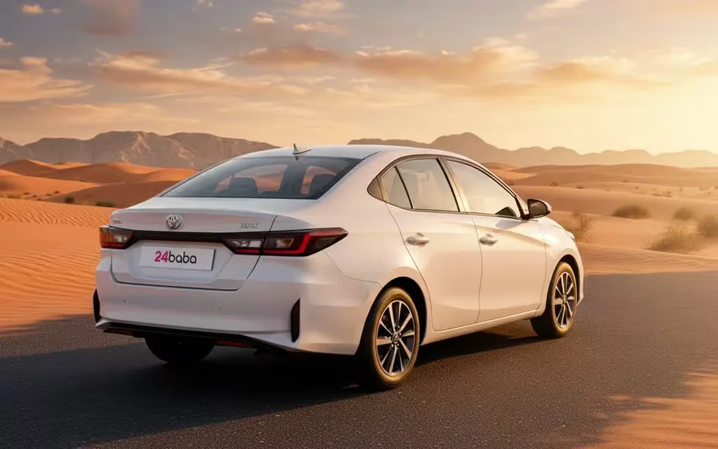 Toyota Yaris 2024 White rear view showing taillights – rental in Dubai