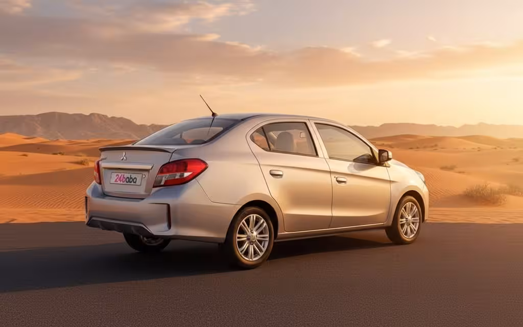 Mitsubishi Attrage 2024 Silver rear view showing taillights – rental in Dubai