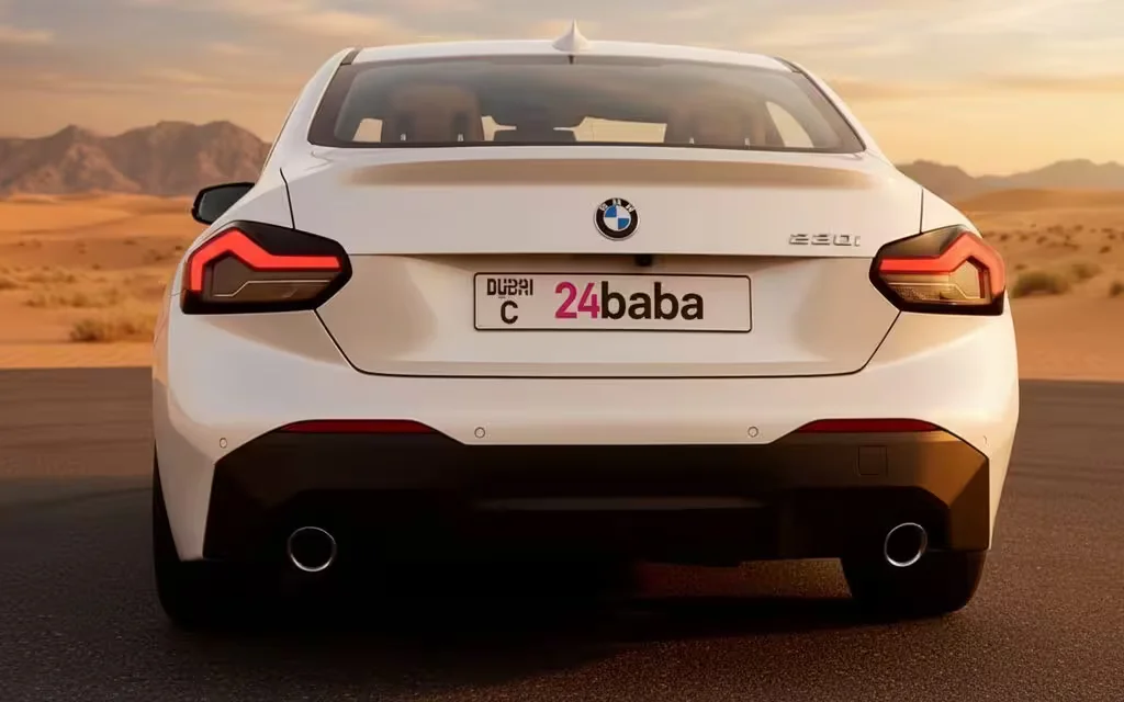 Bmw 230 2023 White rear view showing taillights – rental in Dubai
