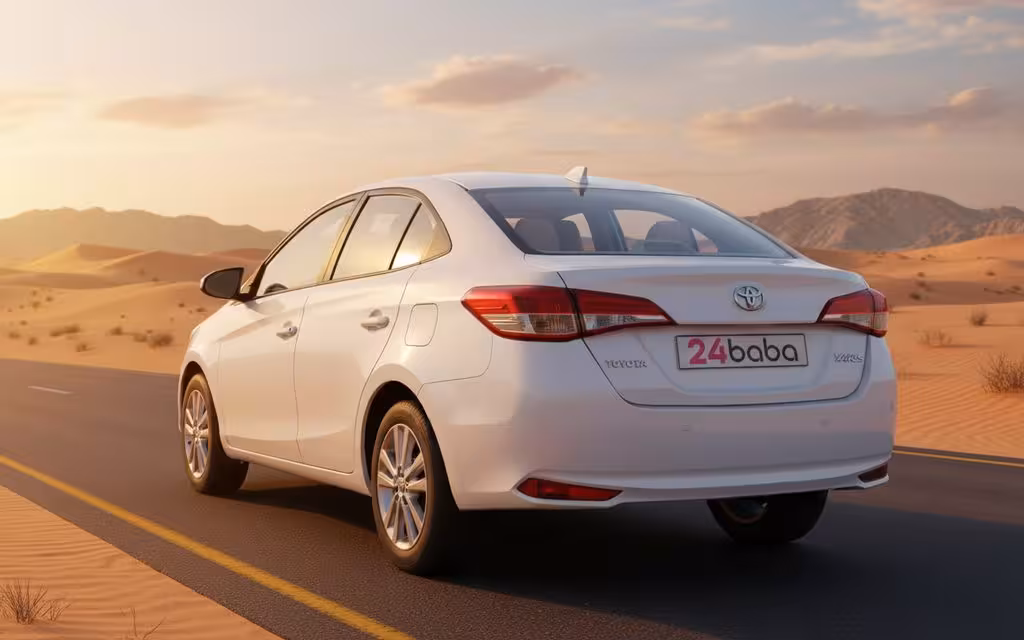 Toyota Yaris 2021 White rear view showing taillights – rental in Dubai