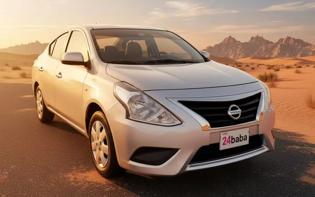 Nissan Sunny 2024 Silver front view with headlights – rental in Dubai