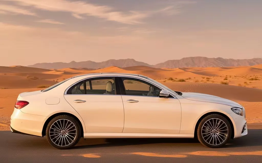 Mercedes E450 2021 White side profile – rental in Dubai