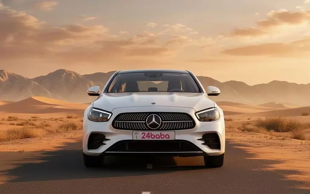 Mercedes E450 2021 White front view with headlights – rental in Dubai