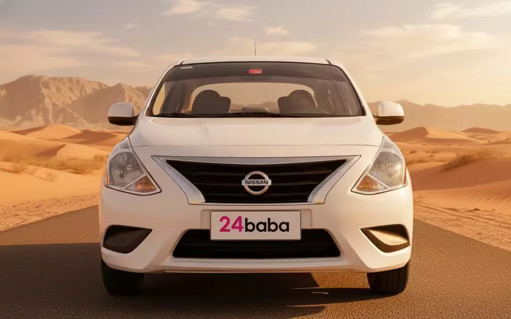 Nissan Sunny 2024 White front view with headlights – rental in Dubai