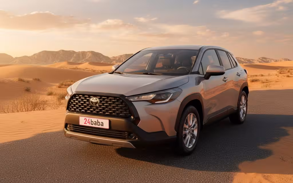 Toyota CorollaCross 2024 Beige front view with headlights – rental in Dubai