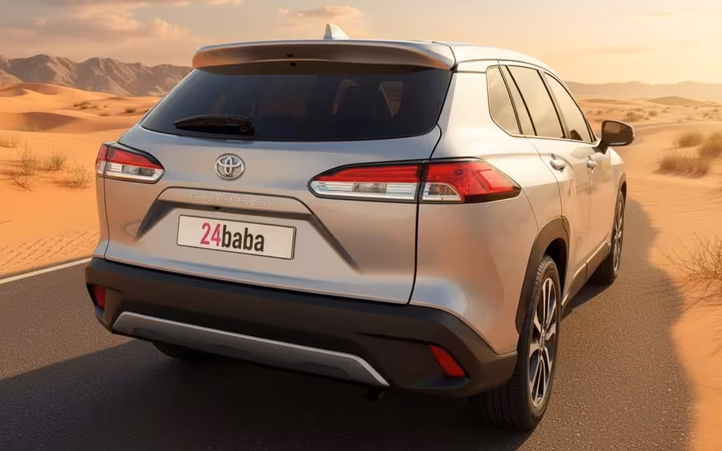 Toyota CorollaCross 2024 Beige rear view showing taillights – rental in Dubai
