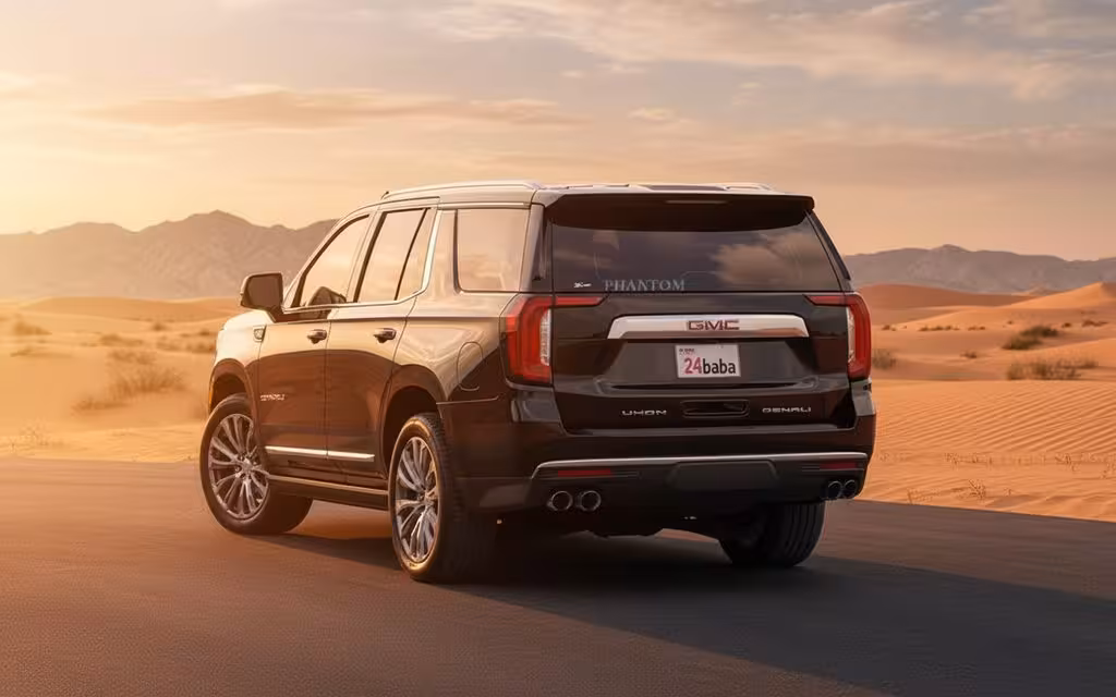 Gmc Yukon 2021 Black rear view showing taillights – rental in Dubai