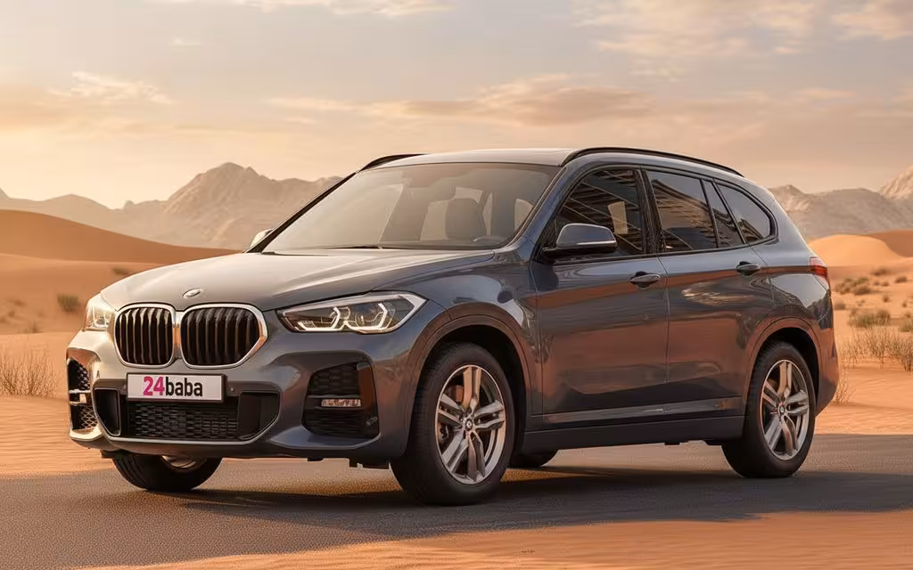 Bmw X1 2021 Blue front view with headlights – rental in Dubai