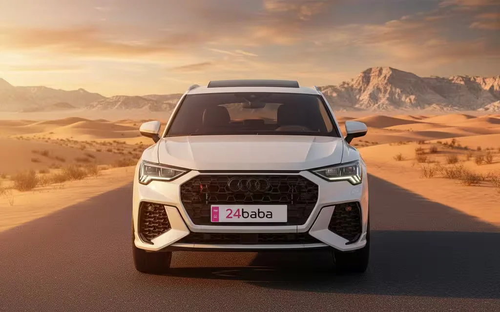 Audi Q3 2021 White front view with headlights – rental in Dubai