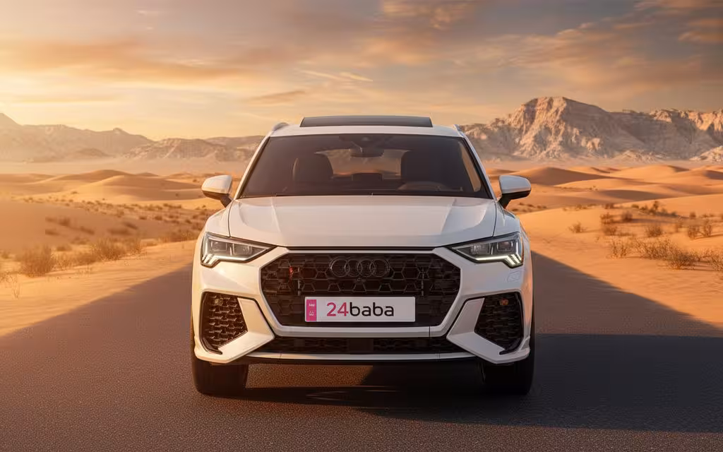 Audi Q3 2021 White front view with headlights – rental in Dubai
