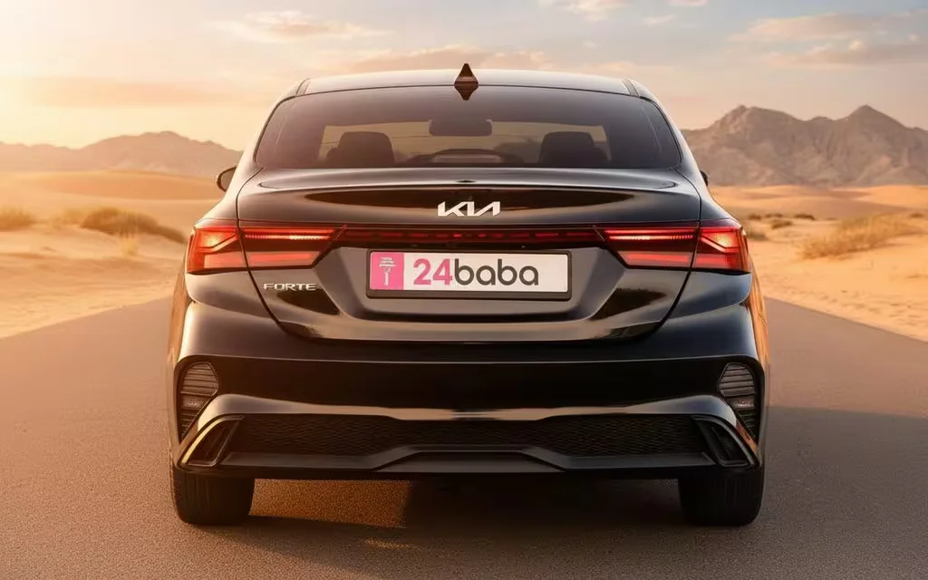 Kia Forte 2024 Black rear view showing taillights – rental in Dubai