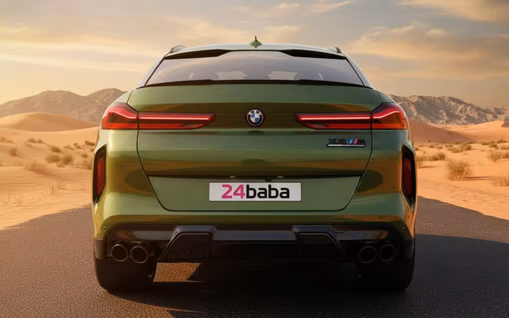 Bmw X6 2023 Green rear view showing taillights – rental in Dubai