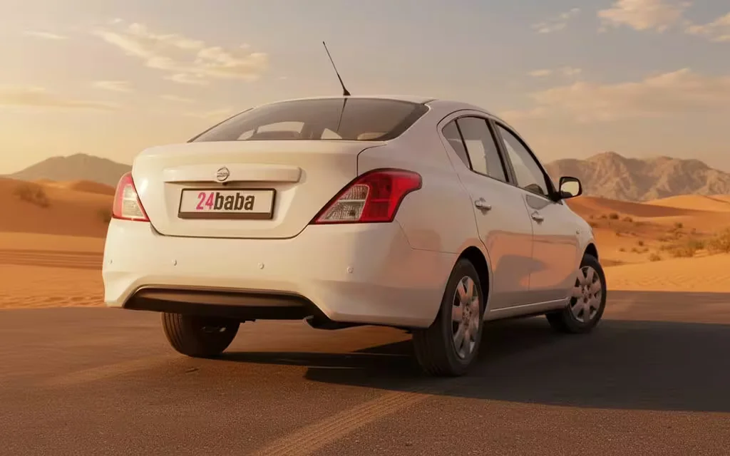 Nissan Sunny 2024 White rear view showing taillights – rental in Dubai