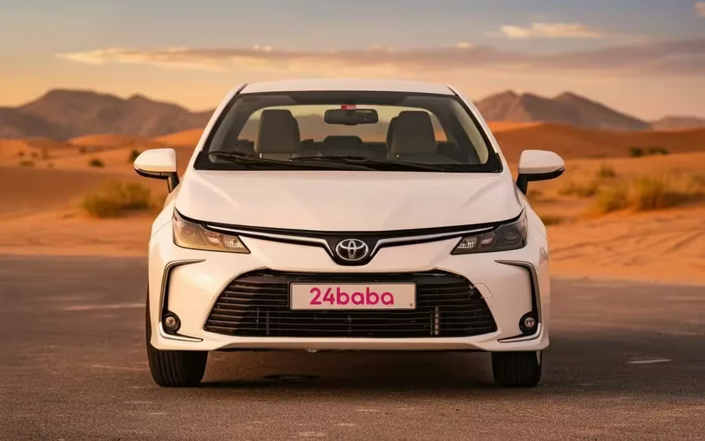 Toyota Corolla 2020 White front view with headlights – rental in Dubai