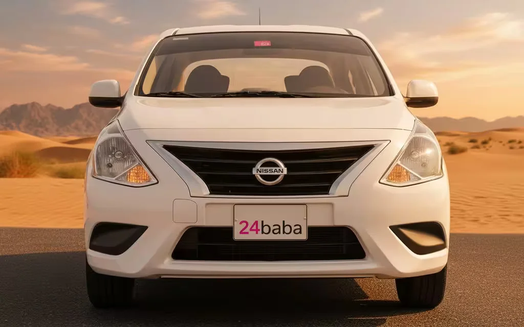 Nissan Sunny 2023 White front view with headlights – rental in Dubai