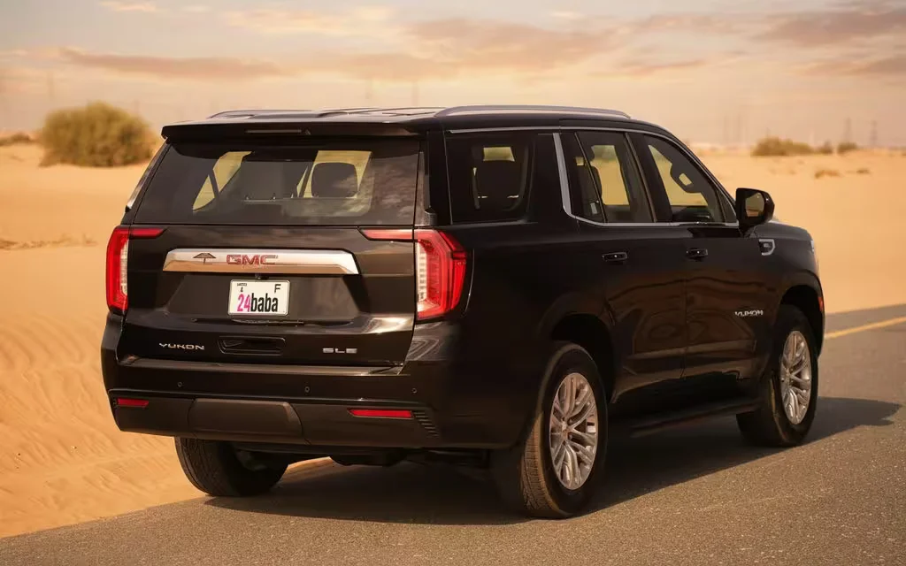 Gmc Yukon 2024 Black rear view showing taillights – rental in Dubai