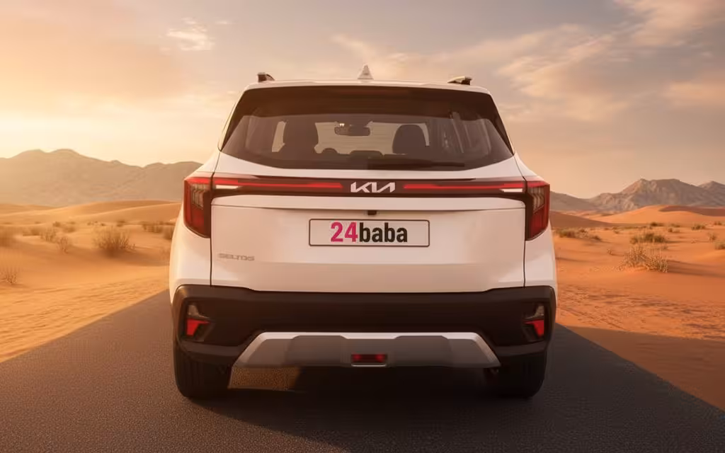 Kia Seltos 2024 White rear view showing taillights – rental in Dubai