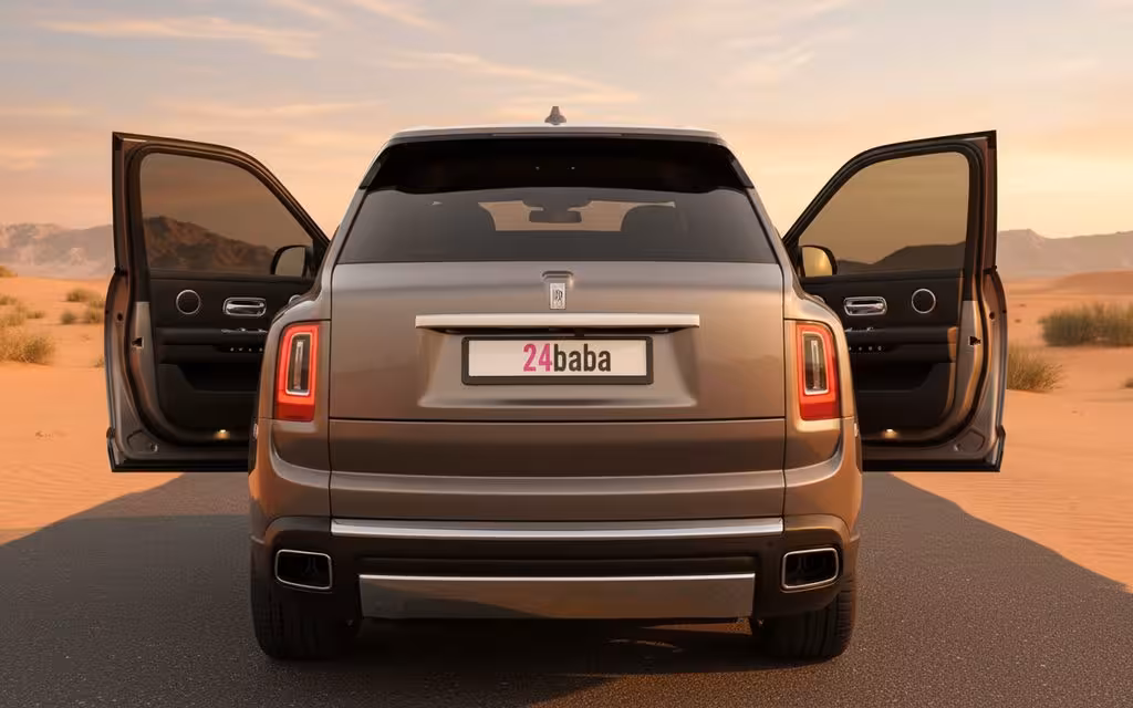 RollsRoyce Cullinan 2021 Silver rear view showing taillights – rental in Dubai